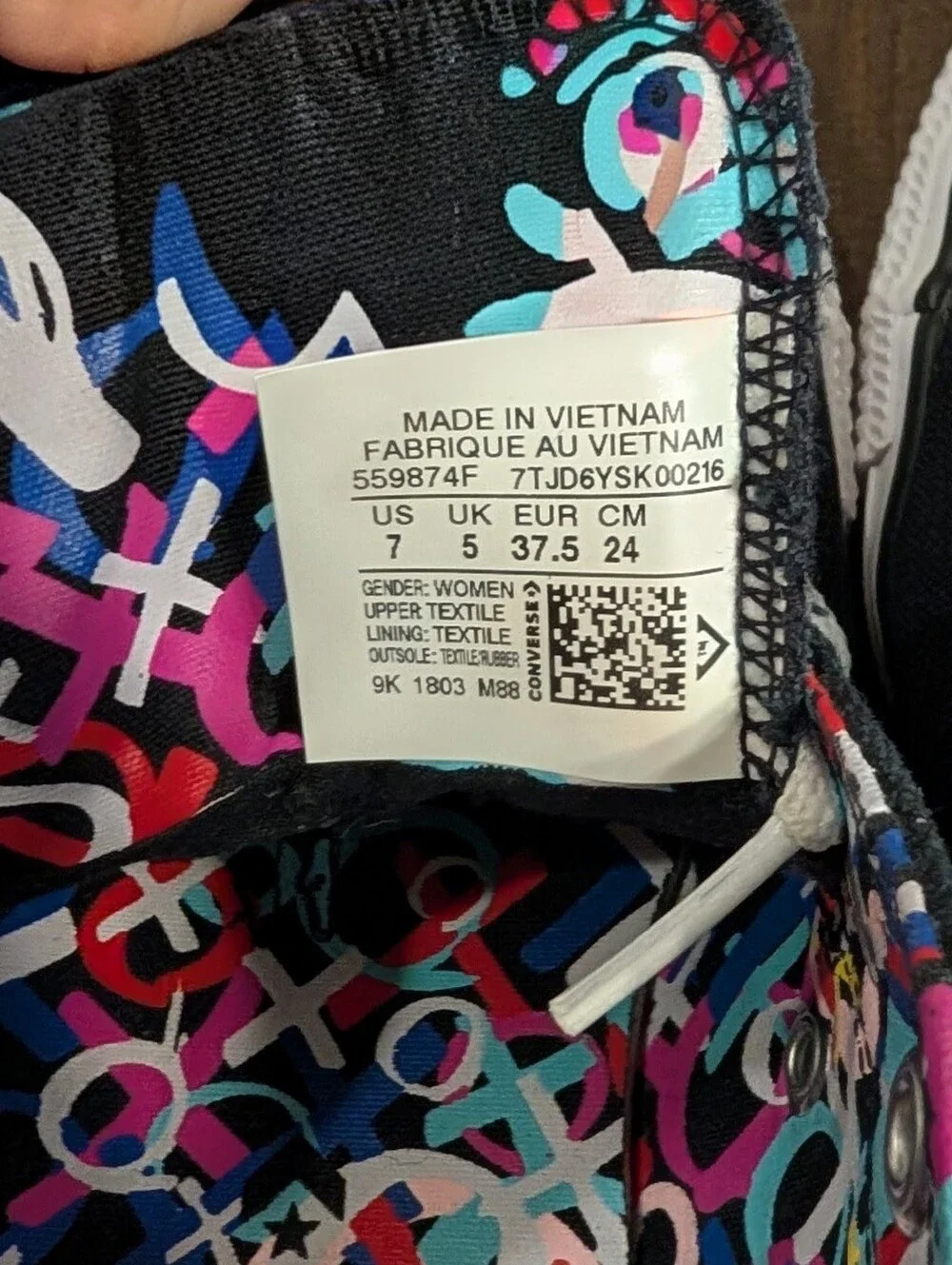 Converse Black Low Top Sneakers with Colorful Patterned Lining